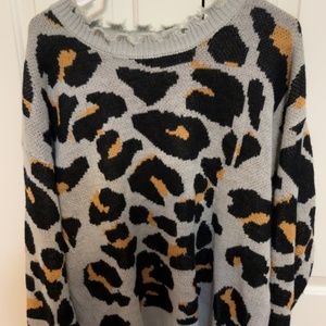 Distressed leopard sweater